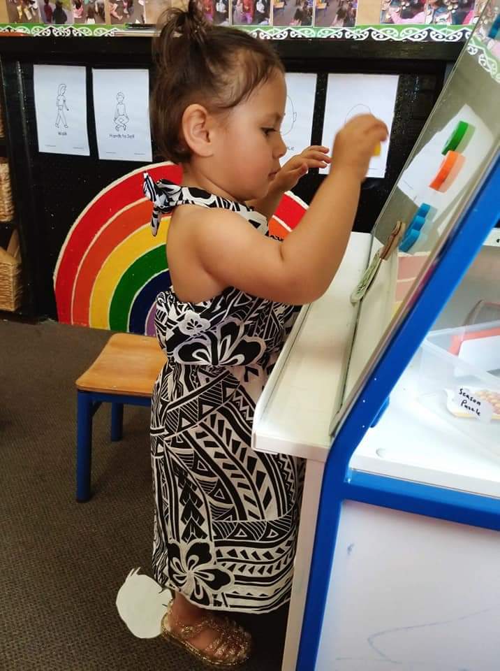 Girl playing with magnets
