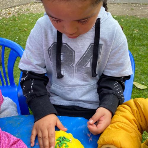 Girl playing with playdough